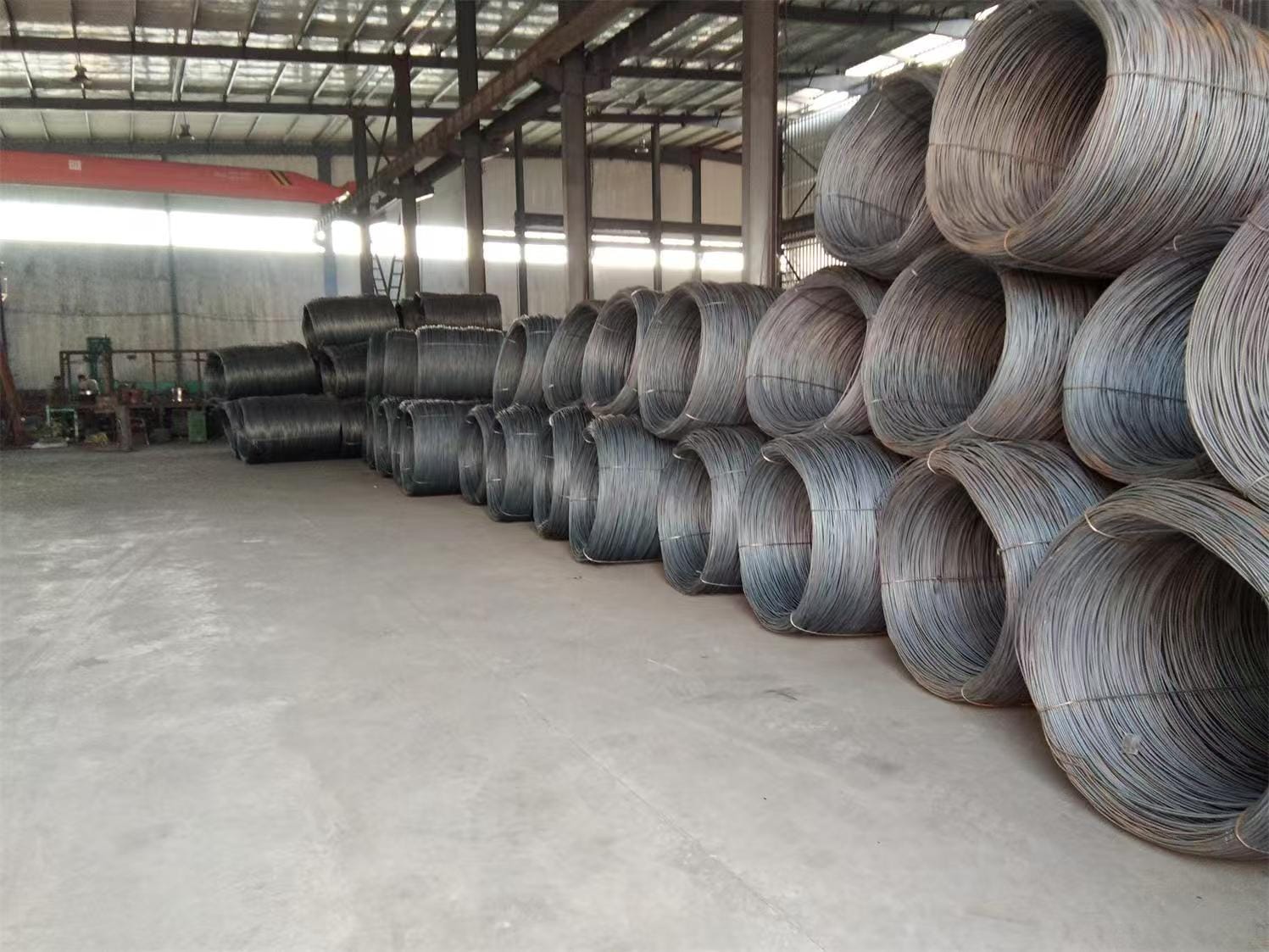 Steel wire coils in Kin Metal factory warehouse